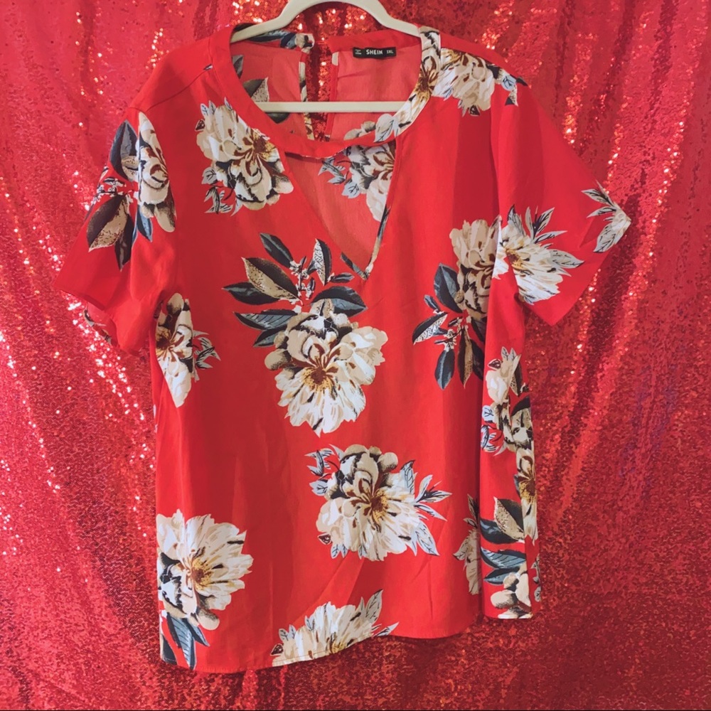 Red floral blouse